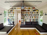 Un salón con librería para un toque chic y moderno